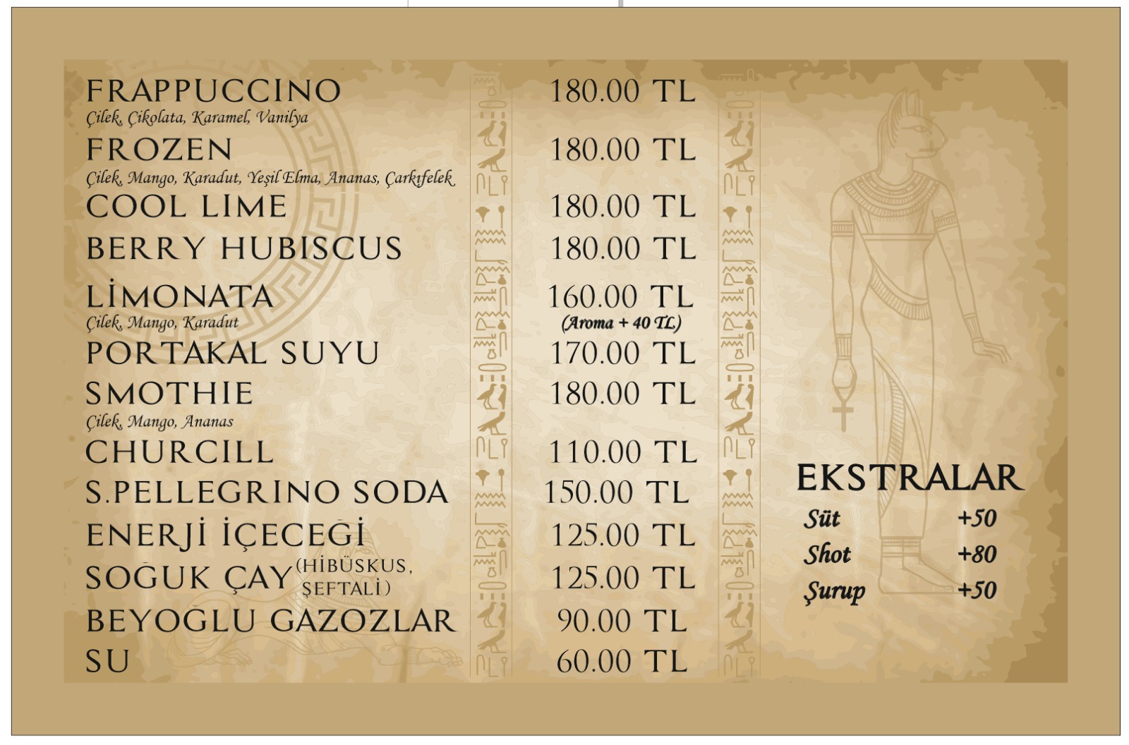 Kafe menüsünün soğuk içecekler ve ekstralar bölümünü gösteren, antik Mısır temalı tasarıma sahip görsel menü.